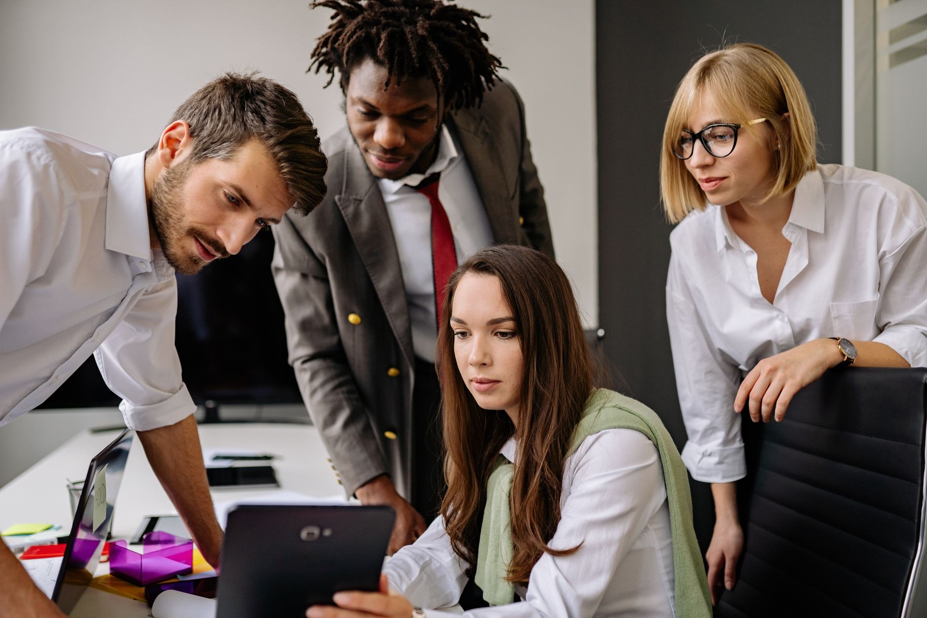 professionals collaborating with AI tools